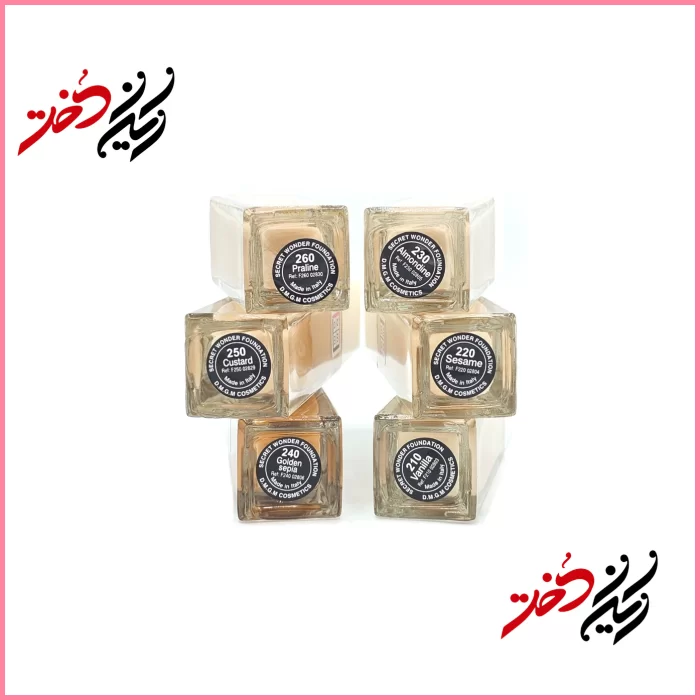 D.M.G.M-Cosmetics-Secret-Wonder-Foundation-Assorted-Shades-210-Vanilla-220-Sesame-230-Almondine-240-Golden-Sepia-250-Custard-260-Praline فوندیشن DMGM Secret Wonder Foundation – نمای چند رنگ با ظرف شیشهای و برچسب مشکی – طراحی ساده و حرفهای – عرضهشده توسط ایران دخت